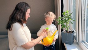 Interaction between mother and her little daughter as watering potted plants by the window. Emphasises bonding, responsibility, and nature appreciation - Powered by Shutterstock - Get 15% off with code: PIKWIZARD15