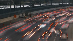  Dynamic Night Highway Time-lapse: Blurry Car Light Trails and Fast Urban Traffic Flow. Busy City Commute, Speed, Modern Transportation. - Powered by Shutterstock - Get 15% off with code: PIKWIZARD15