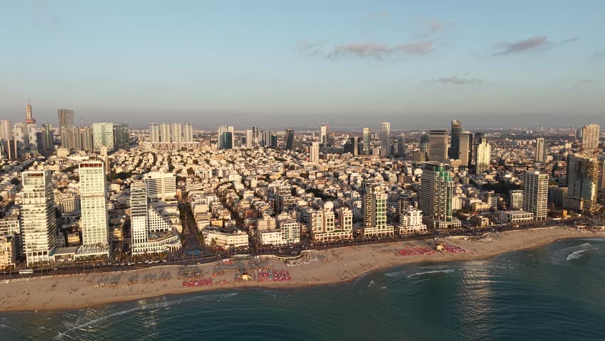 Aerial video of the coastline and promenade of the city of Tel Aviv