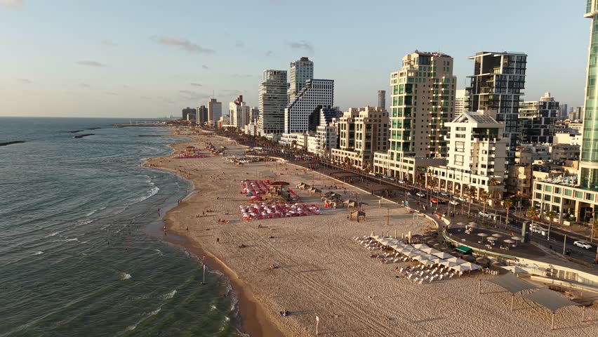 Aerial video of the coastline and promenade of the city of Tel Aviv