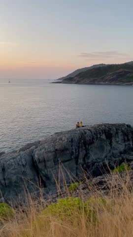 A golden sunset over a secluded island.