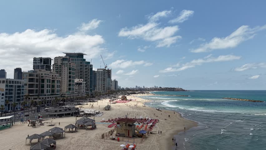 Aerial video of the coastline and promenade of the city of Tel Aviv