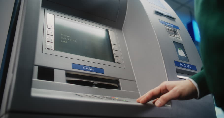 ATM User Entering PIN Code on ATM Keypad for Money Withdrawal. Error Message on Cash Machine Screen About Cancelled Transaction Due to Lack of Cash. Cash Transactions, Banking System. Close Up Shot.