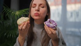 Woman with eating disorder eating two donuts with pleasure and at the same time - Powered by Shutterstock - Get 15% off with code: PIKWIZARD15