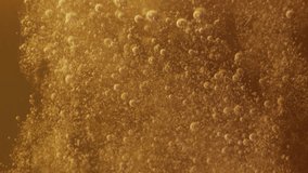 Slow motion macro shot beer pouring into a glass. Beautiful Beer Bubbles Rising Up. Loopable Animation of Sparkling Water. Video 4K - Powered by Shutterstock - Get 15% off with code: PIKWIZARD15