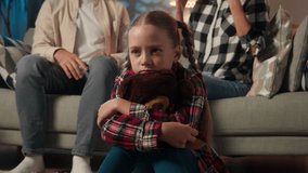 Sad child girl kid daughter upset suffering hugging toy Teddy bear close ears with hands ignore stress loud quarrel between parents mother father at home man woman arguments violence divorce family - Powered by Shutterstock - Get 15% off with code: PIKWIZARD15