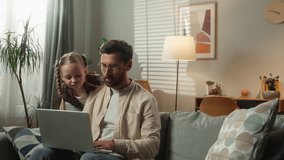 Busy freelancer father man male dad working at home laptop distant from home online remote job angry talking irritated with bad behavior attention noisy child kid girl daughter disturb family problem - Powered by Shutterstock - Get 15% off with code: PIKWIZARD15