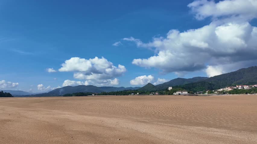 Time lapse of clouds moving over Urdaibai Biosphere Reserve on sunny day