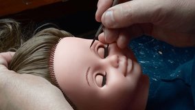 toy factory production assembly and packaging of plastic dolls for children - Powered by Shutterstock - Get 15% off with code: PIKWIZARD15