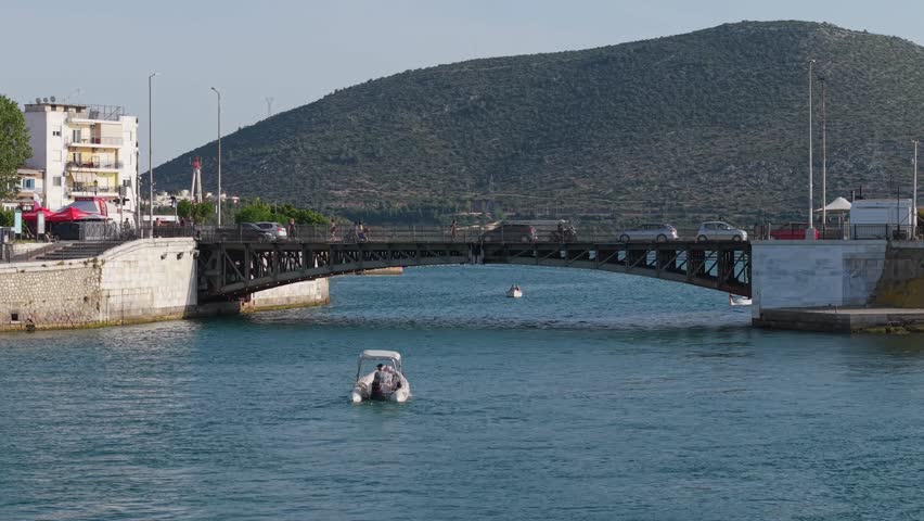 Boat Approaching the Old Bridge of Chalkida, Greece