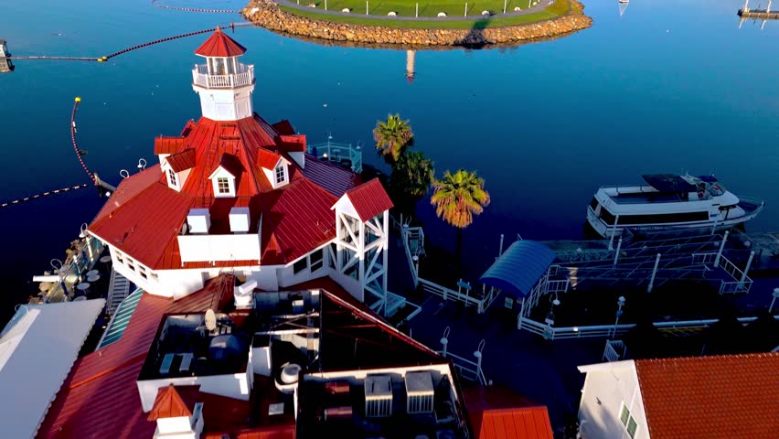ShoreLine Aquatic Park reveal at dawn with calm waters and downtown Long Beach, CA skyline in the background