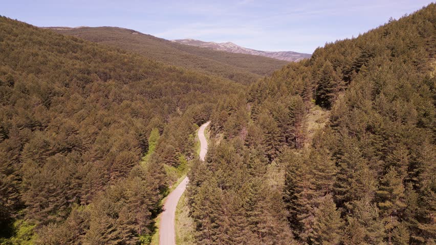 Large rock formations on the slopes of the mountains that form an idyllic landscape, Somosierra, Spain.