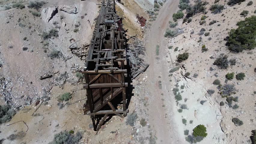 Horn Mine near Milford, Utah. Flight travels from the ore hopper bin and along the tramway that transferred ore from the head frame.