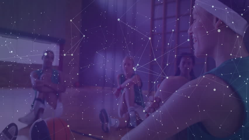 Six spin class riders pedaling bikes in studio causing floating data panels cycling metrics. Fitness, technology, performance, innovation, training, biomechanics, motivation - Powered by Shutterstock - Get 15% off with code: PIKWIZARD15