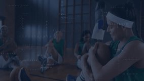 Coach cueing players stretching on gym court headband player passing basketball for sports warmup. Athletics, teamwork, camaraderie, high-energy, sportswear, training, motivation - Powered by Shutterstock - Get 15% off with code: PIKWIZARD15