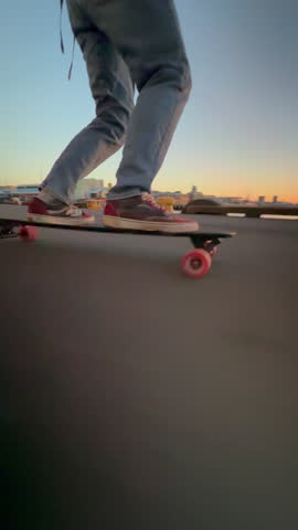 Skateboarding at sunset on Auckland’s pier, with close-up footwork, seagulls in flight, and golden-hour light. Captured in smooth 60fps.