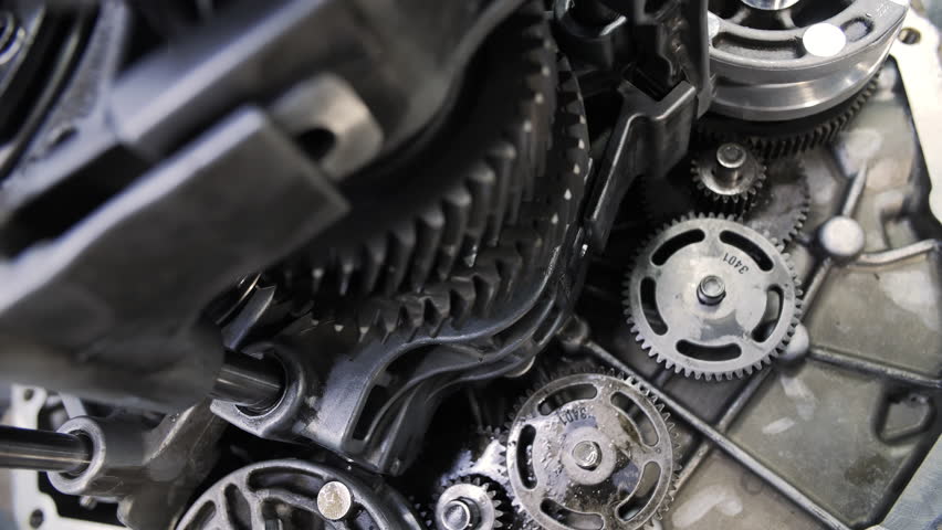 Disassembled car transmission with exposed internal gear system