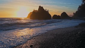 Strong Waves of the Pacific Ocean crash against the shore at Ruby Beach during sunset in Olympic National Park, Washington, USA. 4K UHD video. - Powered by Shutterstock - Get 15% off with code: PIKWIZARD15