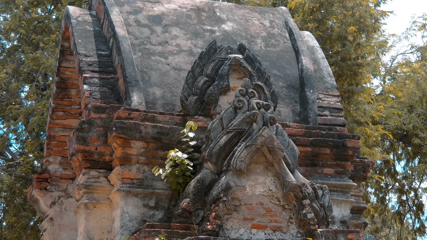 Ruins of an ancient exotic arch in Wat Chaiwatthanaram, Ayutthaya, Thailand. Shot in motion 