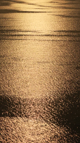 Ocean Sunset Golden Ocean Horizon Shimmers at dusk due to light reflection.