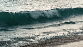 Rain at sea. Dark storm clouds, rain, and sea surface at sunset. Waves crashing on the shore. Natural background. Storm at sea. High quality 4k footage - Powered by Shutterstock - Get 15% off with code: PIKWIZARD15
