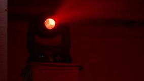 Vibrant red spotlight illuminates a smoky dance floor during a party. Minimal scene with rich color, haze and nightclub atmosphere. High quality 4k footage - Powered by Shutterstock - Get 15% off with code: PIKWIZARD15
