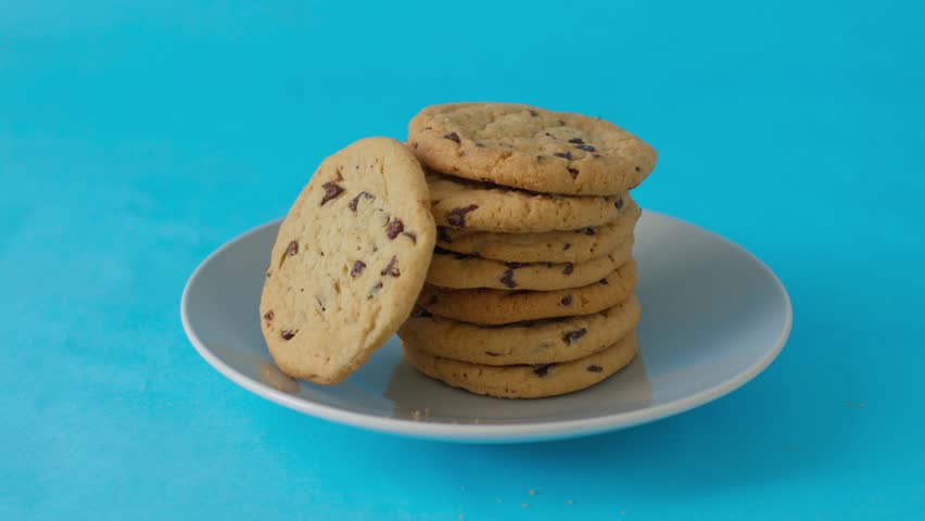 A plate of cookies with a blue background
