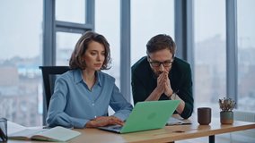 Excited managers celebrating success looking laptop at office with panoramic window closeup. Overjoyed business people rejoicing achievement. Happy coworkers reacting on win emotionally at workplace. - Powered by Shutterstock - Get 15% off with code: PIKWIZARD15