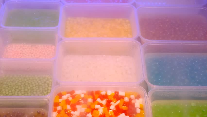 fresh fruit and vegetable casseroles in dry ice smoke clouds fog at the market in Chongqing, China