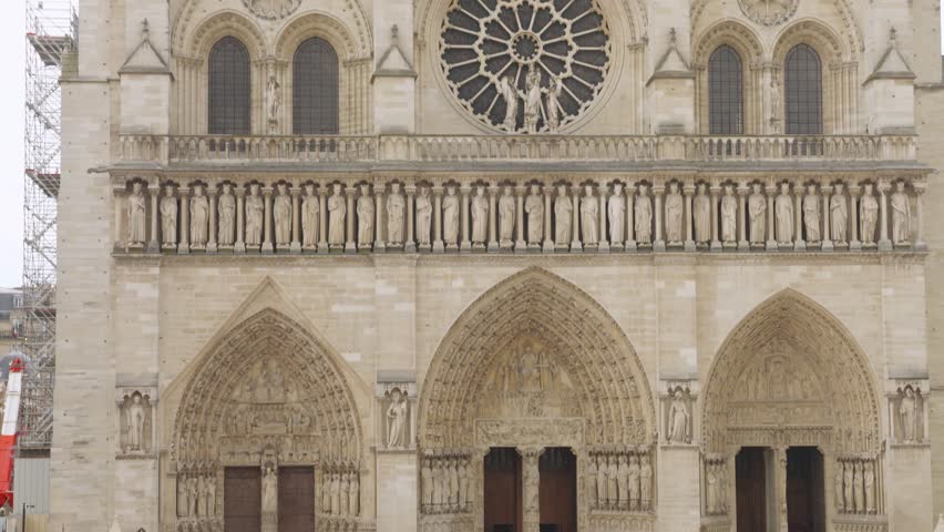View on the medieval Catholic cathedral church Notre-Dame de Paris in French Gothic style on the island Ile de la Cite, 4th arrondissement of Paris, France.
