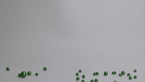 A set of four beautiful, pearl-like spheres with a luxurious glossy finish.
Realistic color pearls. 3d pearl green gold white nacre ball, gemstone beautiful necklace beads multicolor orb gems jewelry - Powered by Shutterstock - Get 15% off with code: PIKWIZARD15