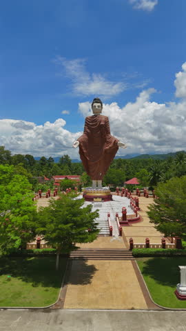 Aerial shot over Wat Maha That Wachiramongkol (Wat Bang Thong) is a famous temple in Krabi Province, Thailand. It is a beautiful Buddhist temple. And a lot Visitors come to visit the temple.