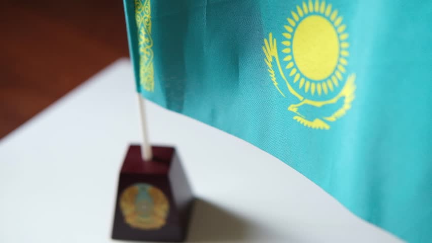 Kazakhstan Wavy Flag on the table in the office