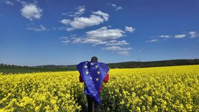 Springlike European Union: Flag in the rapeseed field - Powered by Shutterstock - Get 15% off with code: PIKWIZARD15