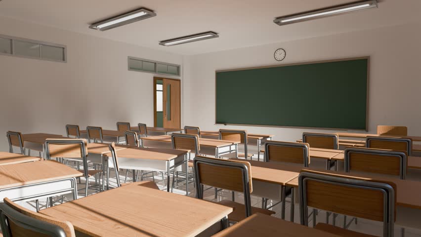 A welllit and organized classroom that features desks, comfortable chairs, and a green chalkboard for learning