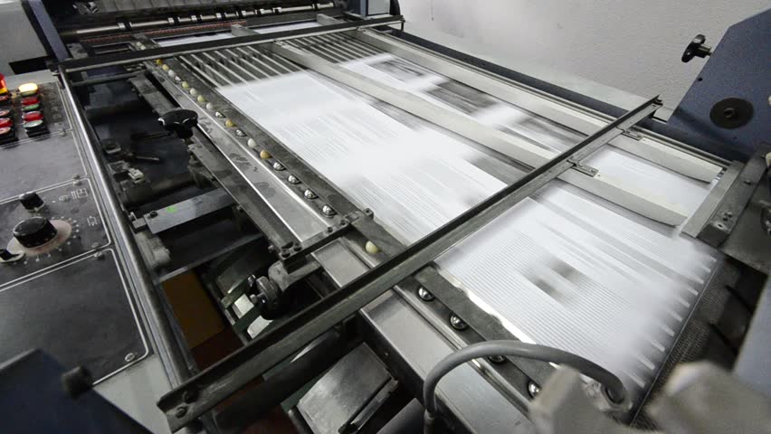 Machine Folding Paper in Action