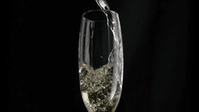 Sparkling wine pouring into flute causing bubbles swirling as red hearts drifting celebrating love. Celebration, romance, elegance, shimmer, effervescence, affection, luxury - Powered by Shutterstock - Get 15% off with code: PIKWIZARD15