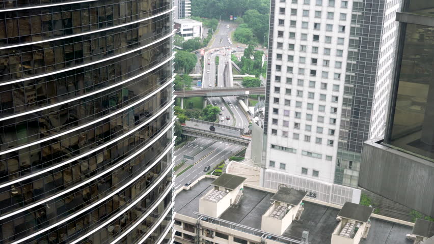 Kuala Lumpur, Malaysia. 2nd December 2024. View of traffic between two buildings in Kuala Lumpur