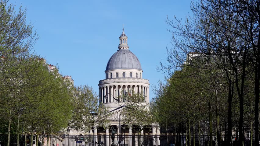 Wide view of the imposing architecture of the Luxembourg Garden Dome in Paris during summer days.