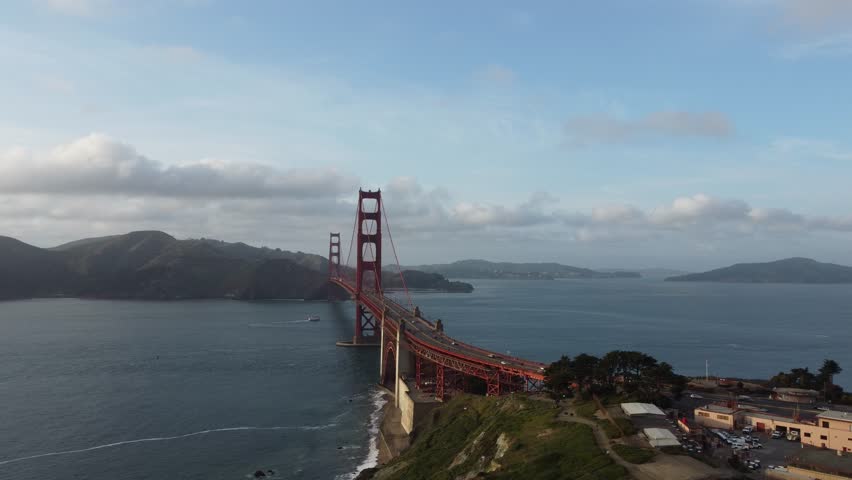 Aerial Drone Capturing The Golden Gate Bridge (South Entrance Side) Connecting To The Scenic California Coastal Trail In The Presidio District of San Francisco, California, USA.