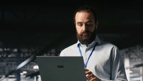 Programmer on data center platform using laptop to monitor neural network LLM visualization. Industrial server farm IT professional overseeing rigs powering machine learning processes - Powered by Shutterstock - Get 15% off with code: PIKWIZARD15