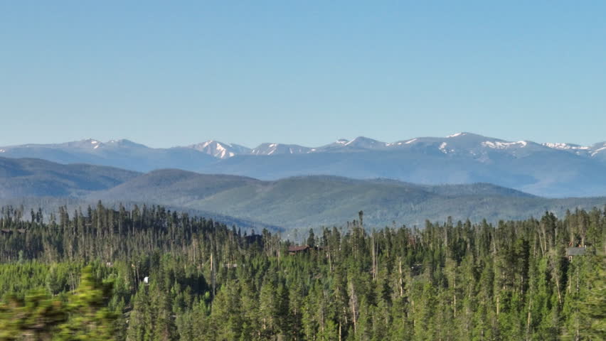 Telephoto drone shot of sunrise in the Rocky Mountains of Colorado
