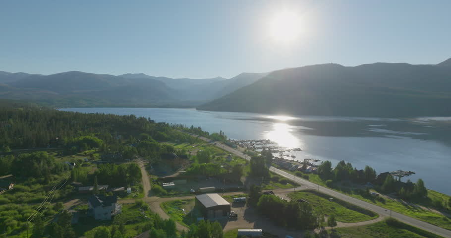 Panning drone shot of Shadow Mountain Lake at sunset in the Rocky Mountains of Colorado