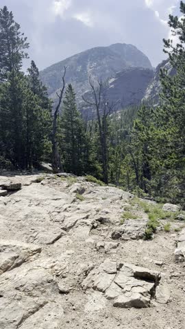 Sky Pond, Loch Vale, Lake of Glass, Timberline Falls, Rocky Mountain National Park, Colorado, 4K HDR, vertical video, cinematic nature, mountain landscape, alpine lake, glacial lake, waterfall