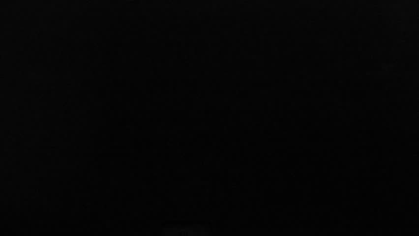 Explosive Smoke Filling of Space. White smoke explodes frontally into the frame, filling the entire black screen