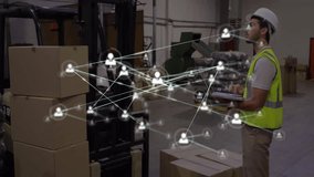 Warehouse worker scrolling tablet and initiating digital user network overlay monitoring inventory. Industrial, logistics, connectivity, digital, automation, efficiency, technology - Powered by Shutterstock - Get 15% off with code: PIKWIZARD15