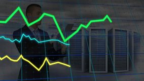 Businessman tapping tablet in data center, generating holographic trend lines for server monitoring. Technology, data visualization, digital analytics, innovation, enterprise, cybersecurity, futurism - Powered by Shutterstock - Get 15% off with code: PIKWIZARD15