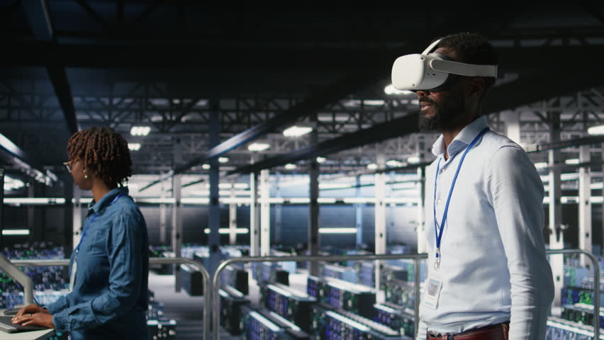 Data center admin using VR headset to monitor neural network AI systems. Server room employee using virtual reality tech to oversee equipment powering machine learning processes, camera A - Powered by Shutterstock - Get 15% off with code: PIKWIZARD15
