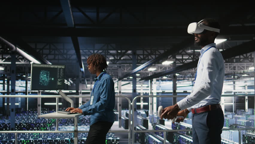 Engineer using VR headset in data center to update server tech, configuring equipment using software tools. Server hub employee reviewing hardware analytics using virtual reality, camera A