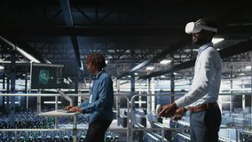 Engineer using VR headset in data center to update server tech, configuring equipment using software tools. Server hub employee reviewing hardware analytics using virtual reality, camera A - Powered by Shutterstock - Get 15% off with code: PIKWIZARD15